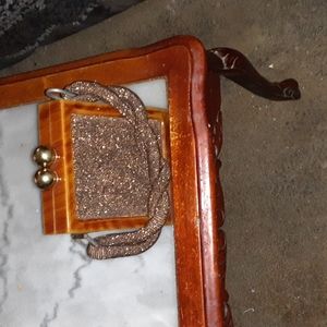 Vintage Baklite frame with Cooper mesh metallic inside round gold ball closure